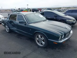 2003 Jaguar XJ with VIN SAJDA15B73MF53499, listed as a IAAI auction lot 41896445 with 95,055 mi miles and . Bid and sale history available at DreamBid. Image 1.