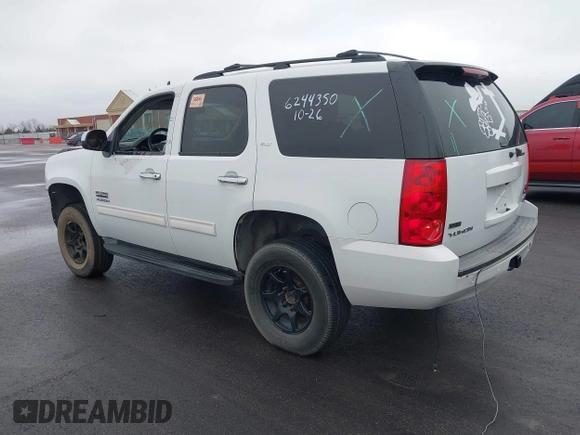 2011 GMC Yukon SLT with VIN 1GKS1CE01BR101311, listed as a IAAI auction lot 41572486 with 1 mi miles. Bid and sale history available at carsss.com. Image 3.