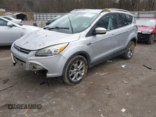 2014 Ford Escape Titanium with VIN 1FMCU9J94EUE51012, listed as a IAAI auction lot 41497105 with 153,031 mi miles. Bid and sale history available at carsss.com. Image 2.