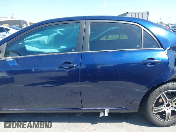 2012 Toyota Corolla L with VIN 2T1BU4EE3CC779137, listed as a IAAI auction lot 42008243 with 123,760 mi miles. Bid and sale history available at carsss.com. Image 15.