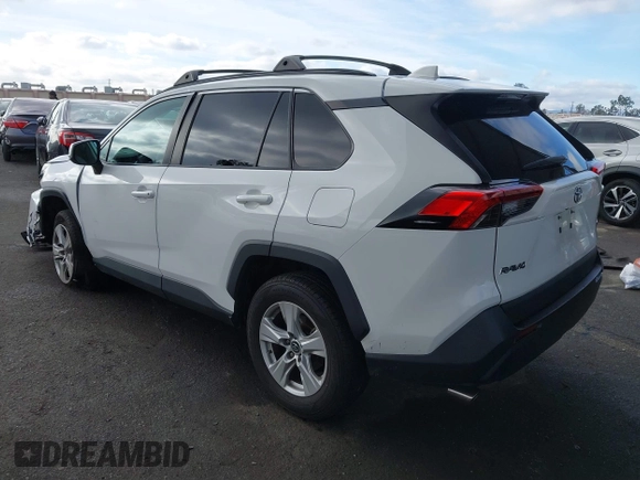 2019 Toyota RAV4 XLE with VIN 2T3W1RFV5KW051023, listed as a IAAI auction lot 40970612 with 106,359 mi miles and . Bid and sale history available at DreamBid. Image 3.