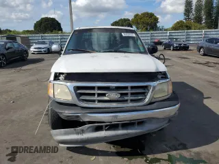 2000 Ford F-150 XL with VIN 1FTRX17W2YNB05575, listed as a Copart auction lot 86606934 with 0 mi miles and Salvage Title. Bid and sale history available at carsss.com. Image 5.