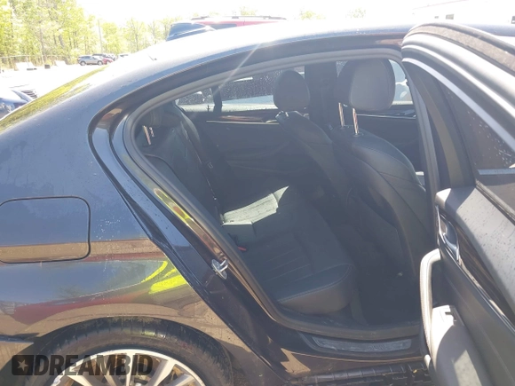 2021 BMW 5 Series 530i xDrive with VIN WBA13BJ0XMWX00677, listed as a IAAI auction lot 42100435 with 66,140 mi miles and . Bid and sale history available at DreamBid. Image 8.