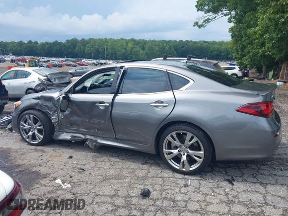2015 Infiniti Q70 with VIN JN1BY1AP6FM540296, listed as a IAAI auction lot 42524538 with 119,933 mi miles and . Bid and sale history available at DreamBid. Image 14.