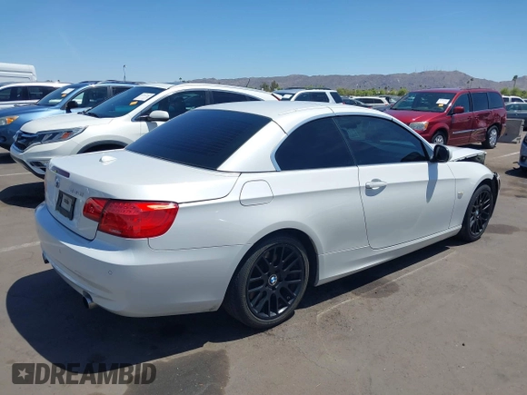 2013 BMW 3 Series 335i with VIN WBADX7C52DJ589093, listed as a IAAI auction lot 42159570 with 107,924 mi miles and . Bid and sale history available at DreamBid. Image 4.