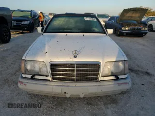 1995 Mercedes-Benz E Class with VIN WDBEA66E0SC275229, listed as a Copart auction lot 77391894 with 64,025 mi miles and Salvage Title. Bid and sale history available at carsss.com. Image 5.