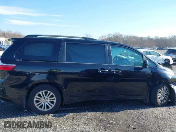 2016 Toyota Sienna XLE with VIN 5TDYK3DC3GS697173, listed as a IAAI auction lot 40899585 with 121,693 mi miles. Bid and sale history available at carsss.com. Image 12.