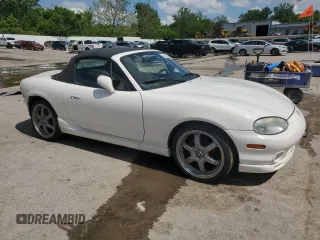 2000 Mazda MX-5 Miata with VIN JM1NB3531Y0152594, listed as a Copart auction lot 57460195 with 78,139 mi miles and Salvage title. Bid and sale history available at DreamBid. Image 4.