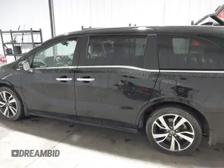 2023 Honda Odyssey Touring z VIN 5FNRL6H85PB039450, wystawiony jako IAAI lot #41504351 z przebiegiem 51 000 mil mil oraz . Historia ofert i sprzedaży dostępna na DreamBid. Obrazek 14.