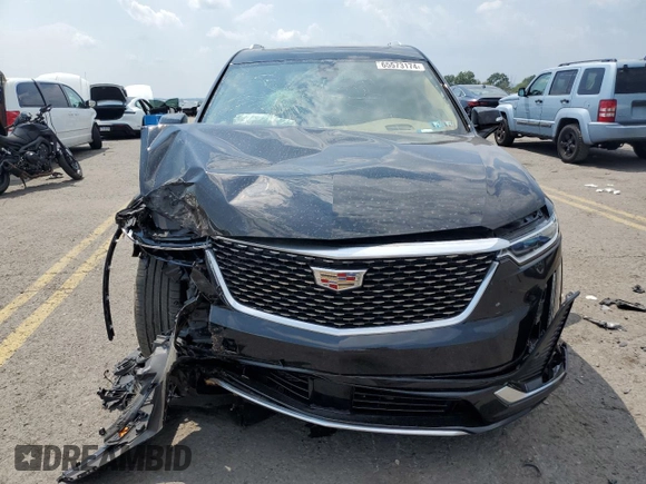 2023 Cadillac XT6 AWD Premium Luxury z VIN 1GYKPFRS7PZ225950, wystawiony jako Copart lot #65573174 z przebiegiem Nie podano mil oraz Szkoda całkowita • Salvage title. Historia ofert i sprzedaży dostępna na DreamBid. Obrazek 5.