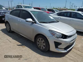 2023 Kia Rio S z VIN 3KPA24AD6PE600384, wystawiony jako IAAI lot #42003099 z przebiegiem 27 001 mil mil oraz . Historia ofert i sprzedaży dostępna na DreamBid. Obrazek 1.