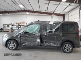 2022 Ford Transit Connect XLT с VIN NM0GE9F24N1543380, выставлен на аукционе IAAI как лот 40194457 с пробегом 26 050 миль миль и . История ставок и продаж доступна на DreamBid. Изображение 14.