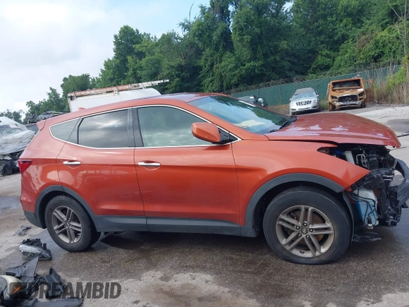 2017 Hyundai Santa Fe 2.4L z VIN 5XYZTDLB6HG451345, wystawiony jako IAAI lot #42665264 z przebiegiem 129 855 mil mil oraz . Historia ofert i sprzedaży dostępna na DreamBid. Obrazek 14.
