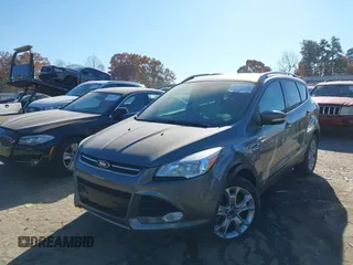 2014 Ford Escape Titanium with VIN 1FMCU9J94EUC50534, listed as a IAAI auction lot 41040341 with 115,502 mi miles. Bid and sale history available at carsss.com. Image 2.