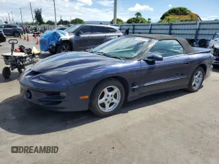 1999 Pontiac Firebird Trans Am with VIN 2G2FV32GXX2229175, listed as a Copart auction lot 65678225 with 180,298 mi miles and Salvage title. Bid and sale history available at DreamBid. Image 1.