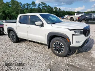 2022 Nissan Frontier SV with VIN 1N6ED1EJ6NN619016, listed as a Copart auction lot 58311855 with 56,943 mi miles and Clean title. Bid and sale history available at DreamBid. Image 4.