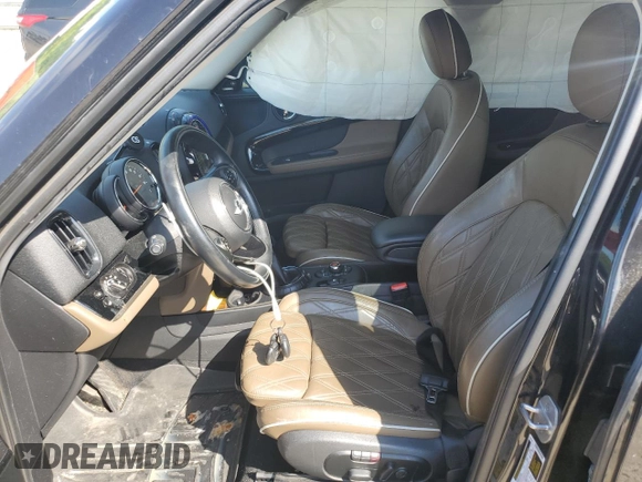 2017 MINI Countryman Cooper S with VIN WMZYT3C39H3D98677, listed as a Copart auction lot 71831944 with 56,638 mi miles and Salvage Title. Bid and sale history available at carsss.com. Image 7.