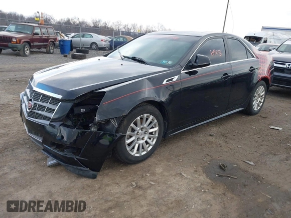 2011 Cadillac CTS z VIN 1G6DC5EY1B0156347, wystawiony jako IAAI lot #41496903 z przebiegiem 128 304 mil mil oraz . Historia ofert i sprzedaży dostępna na DreamBid. Obrazek 2.