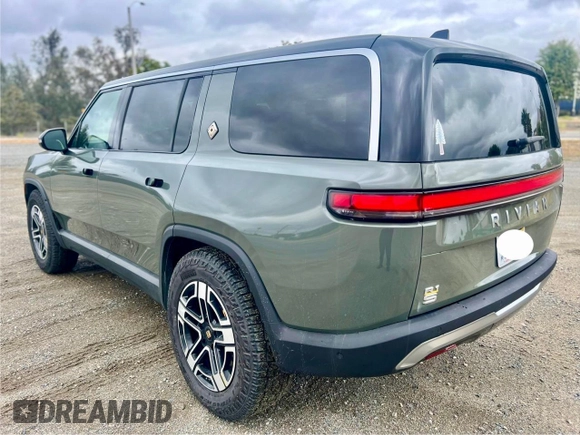 2023 Rivian R1S Launch Edition with VIN 7PDSGABL2PN003733, listed as a Copart auction lot 56033315 with 9,996 mi miles and Salvage Title. Bid and sale history available at carsss.com. Image 3.