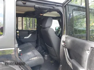 2012 Jeep Wrangler Unlimited Call of Duty MW3 with VIN 1C4BJWFG5CL103267, listed as a IAAI auction lot 42334345 with 135,324 mi miles and . Bid and sale history available at DreamBid. Image 8.
