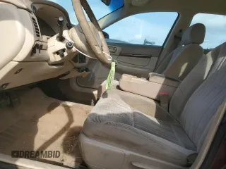 2003 Chevrolet Impala with VIN 2G1WF52E839244903, listed as a Copart auction lot 60290895 with Not provided miles and Salvage title. Bid and sale history available at DreamBid. Image 7.