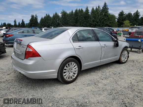 2012 Ford Fusion Hybrid с VIN 3FADP0L30CR284761, выставлен на аукционе Copart как лот 61286445 с пробегом 171 073 миль миль и Списание • Salvage title. История ставок и продаж доступна на DreamBid. Изображение 3.