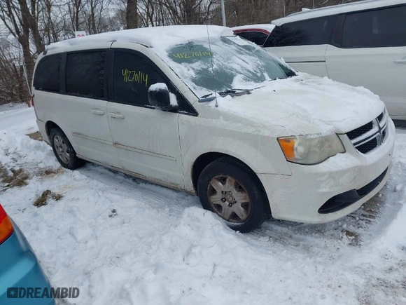 2012 Dodge Grand Caravan SE with VIN 2C4RDGBG2CR419489, listed as a IAAI auction lot 41270114 with 124,869 mi miles. Bid and sale history available at carsss.com. Image 1.
