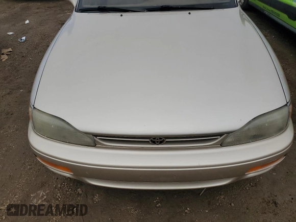1995 Toyota Camry LE z VIN 4T1SK12EXSU529058, wystawiony jako Copart lot #49055255 z przebiegiem 166 029 mil mil oraz Szkoda całkowita • Salvage title. Historia ofert i sprzedaży dostępna na DreamBid. Obrazek 11.