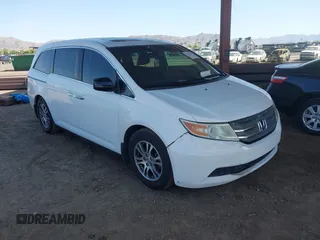 2012 Honda Odyssey EX-L with VIN 5FNRL5H67CB051764, listed as a IAAI auction lot 42493181 with 167,189 mi miles and . Bid and sale history available at DreamBid. Image 1.