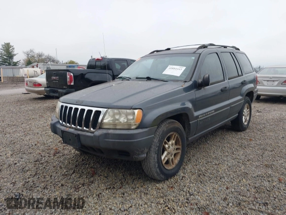 2003 Jeep Grand Cherokee Laredo with VIN 1J4GX48SX3C604904, listed as a IAAI auction lot 40884443 with 188,352 mi miles. Bid and sale history available at carsss.com. Image 18.