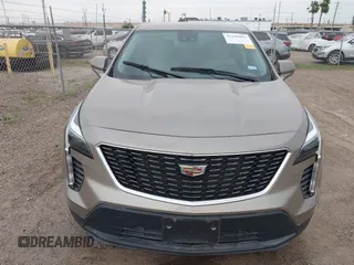 2023 Cadillac XT4 FWD Luxury z VIN 1GYAZAR43PF152992, wystawiony jako IAAI lot #42160015 z przebiegiem 29 466 mil mil oraz . Historia ofert i sprzedaży dostępna na DreamBid. Obrazek 6.