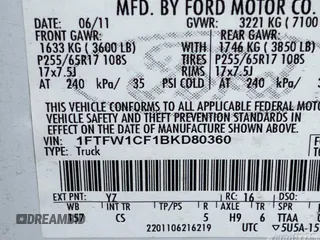 2011 Ford F-150 XL with VIN 1FTFW1CF1BKD80360, listed as a IAAI auction lot 42111754 with 157,139 mi miles. Bid and sale history available at carsss.com. Image 1.