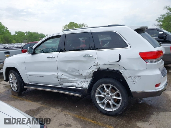 2015 Jeep Grand Cherokee Summit with VIN 1C4RJFJG5FC104087, listed as a IAAI auction lot 42100298 with 88,710 mi miles and . Bid and sale history available at DreamBid. Image 14.