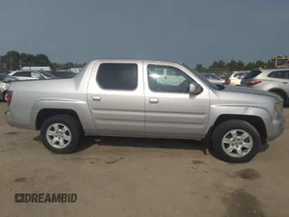 2007 Honda Ridgeline RTL z VIN 2HJYK16537H501200, wystawiony jako IAAI lot #42425662 z przebiegiem 188 618 mil mil oraz . Historia ofert i sprzedaży dostępna na DreamBid. Obrazek 14.
