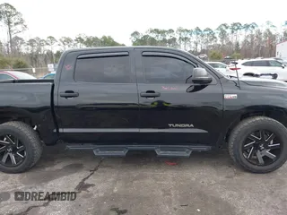 2012 Toyota Tundra 4WD Truck with VIN 5TFDW5F14CX268378, listed as a IAAI auction lot 41412922 with 148,763 mi miles. Bid and sale history available at carsss.com. Image 13.