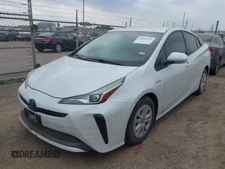 2021 Toyota Prius L Eco with VIN JTDKAMFU5M3132103, listed as a IAAI auction lot 42061511 with 42,116 mi miles and . Bid and sale history available at DreamBid. Image 6.
