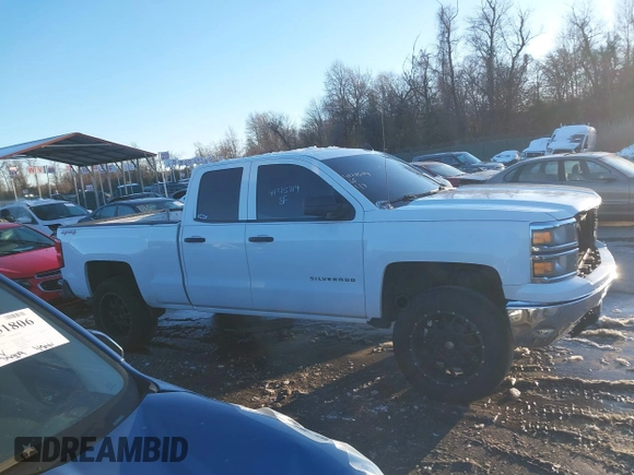 2014 Chevrolet Silverado 1500 LT with VIN 1GCVKREH4EZ148979, listed as a IAAI auction lot 41215714 with 193,710 mi miles and . Bid and sale history available at DreamBid. Image 13.