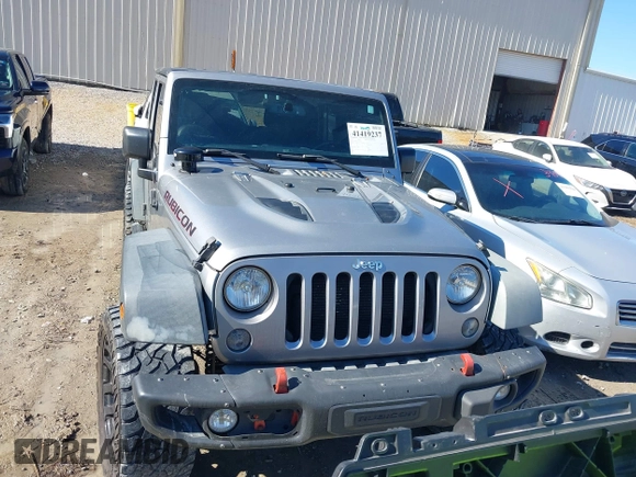2015 Jeep Wrangler Unlimited Rubicon Hard Rock with VIN 1C4HJWFG2FL587607, listed as a IAAI auction lot 41419237 with 109,719 mi miles and . Bid and sale history available at DreamBid. Image 12.
