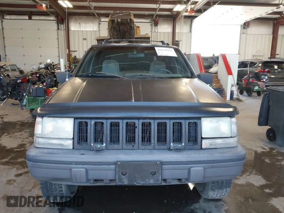 1995 Jeep Grand Cherokee Laredo z VIN 1J4GZ58Y3SC670696, wystawiony jako IAAI lot #42530934 z przebiegiem 165 658 mil mil oraz . Historia ofert i sprzedaży dostępna na DreamBid. Obrazek 12.