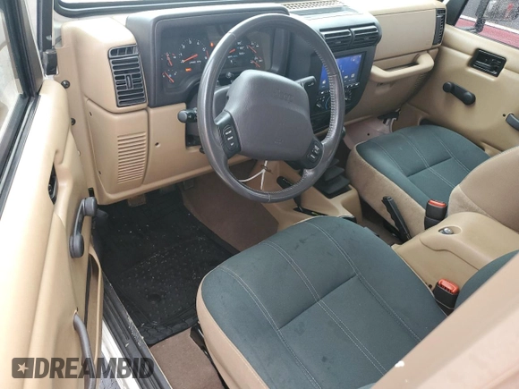 2002 Jeep Wrangler Sahara with VIN 1J4FA59S02P727359, listed as a Copart auction lot 74823414 with 84,186 mi miles and Salvage Title. Bid and sale history available at carsss.com. Image 8.
