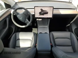 2023 Tesla Model Y Long Range z VIN 7SAYGAEE7PF714828, wystawiony jako Copart lot #89210485 z przebiegiem 42 256 mil mil oraz Szkoda całkowita • Salvage title. Historia ofert i sprzedaży dostępna na DreamBid. Obrazek 8.