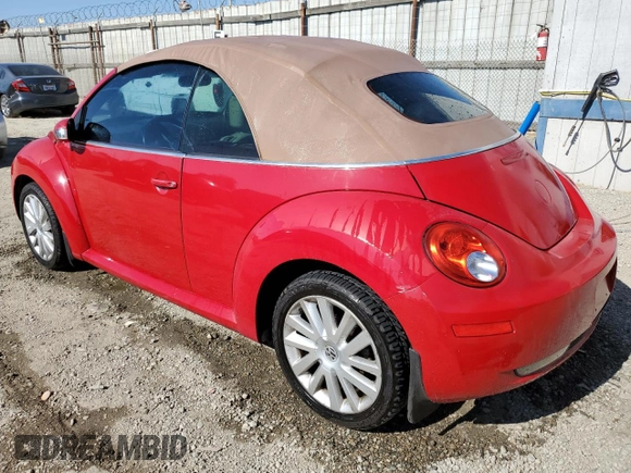 2008 Volkswagen Beetle SE with VIN 3VWRF31YX8M409057, listed as a Copart auction lot 64021115 with 137,841 mi miles and Salvage title. Bid and sale history available at DreamBid. Image 2.