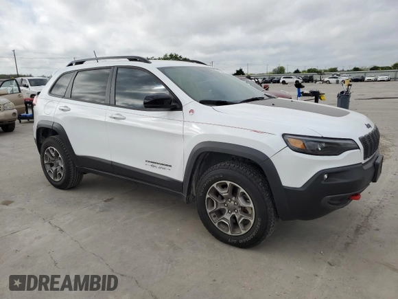 2022 Jeep Cherokee Trailhawk with VIN 1C4PJMBXXND502267, listed as a Copart auction lot 48522564 with 28,554 mi miles and Clean Title. Bid and sale history available at carsss.com. Image 4.