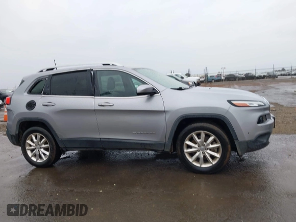 2017 Jeep Cherokee Limited with VIN 1C4PJMDBXHW520195, listed as a IAAI auction lot 41478980 with 125,285 mi miles and . Bid and sale history available at DreamBid. Image 13.