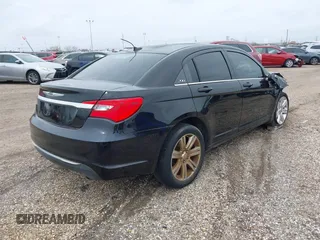 2011 Chrysler 200 Touring with VIN 1C3BC1FG2BN613385, listed as a IAAI auction lot 41381218 with 118,926 mi miles. Bid and sale history available at carsss.com. Image 4.