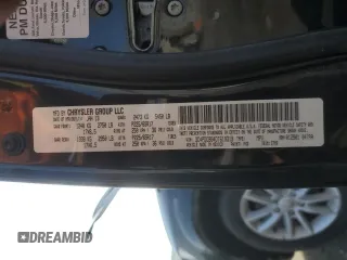 2013 Dodge Journey SXT with VIN 3C4PDCBG4DT619319, listed as a Copart auction lot 62964135 with 140,620 mi miles and Salvage title. Bid and sale history available at DreamBid. Image 13.