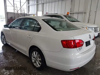 2011 Volkswagen Jetta Sedan SE with VIN 3VWDX7AJ8BM330849, listed as a IAAI auction lot 41972807 with 134,655 mi miles. Bid and sale history available at carsss.com. Image 3.
