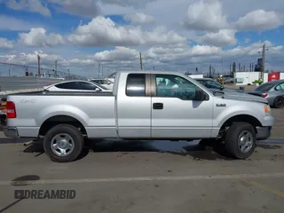 2007 Ford F-150 STX with VIN 1FTRX14W87KC40659, listed as a IAAI auction lot 41423345 with 145,811 mi miles. Bid and sale history available at carsss.com. Image 13.