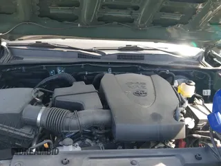 2022 Toyota Tacoma SR with VIN 3TMCZ5AN7NM472484, listed as a IAAI auction lot 42505944 with 59,131 mi miles and . Bid and sale history available at DreamBid. Image 18.