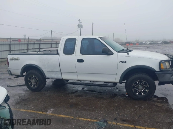 1997 Ford F-150 XL with VIN 1FTDX1863VNB01474, listed as a IAAI auction lot 41446672 with 223,296 mi miles. Bid and sale history available at carsss.com. Image 13.